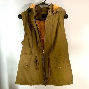 Large green vest with tan fur inside - never worn. Purchased at Tjmaxx.